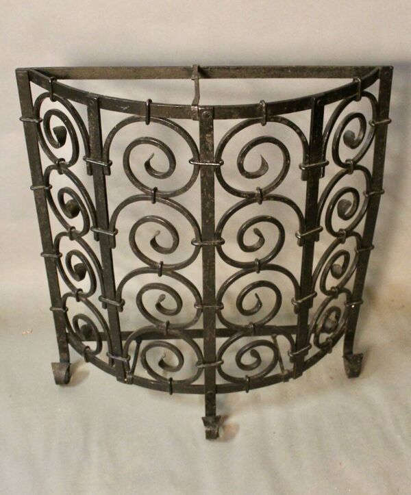 Grille de cheminée en fer forgé