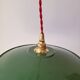 Trio of enameled sheet metal pendant lights