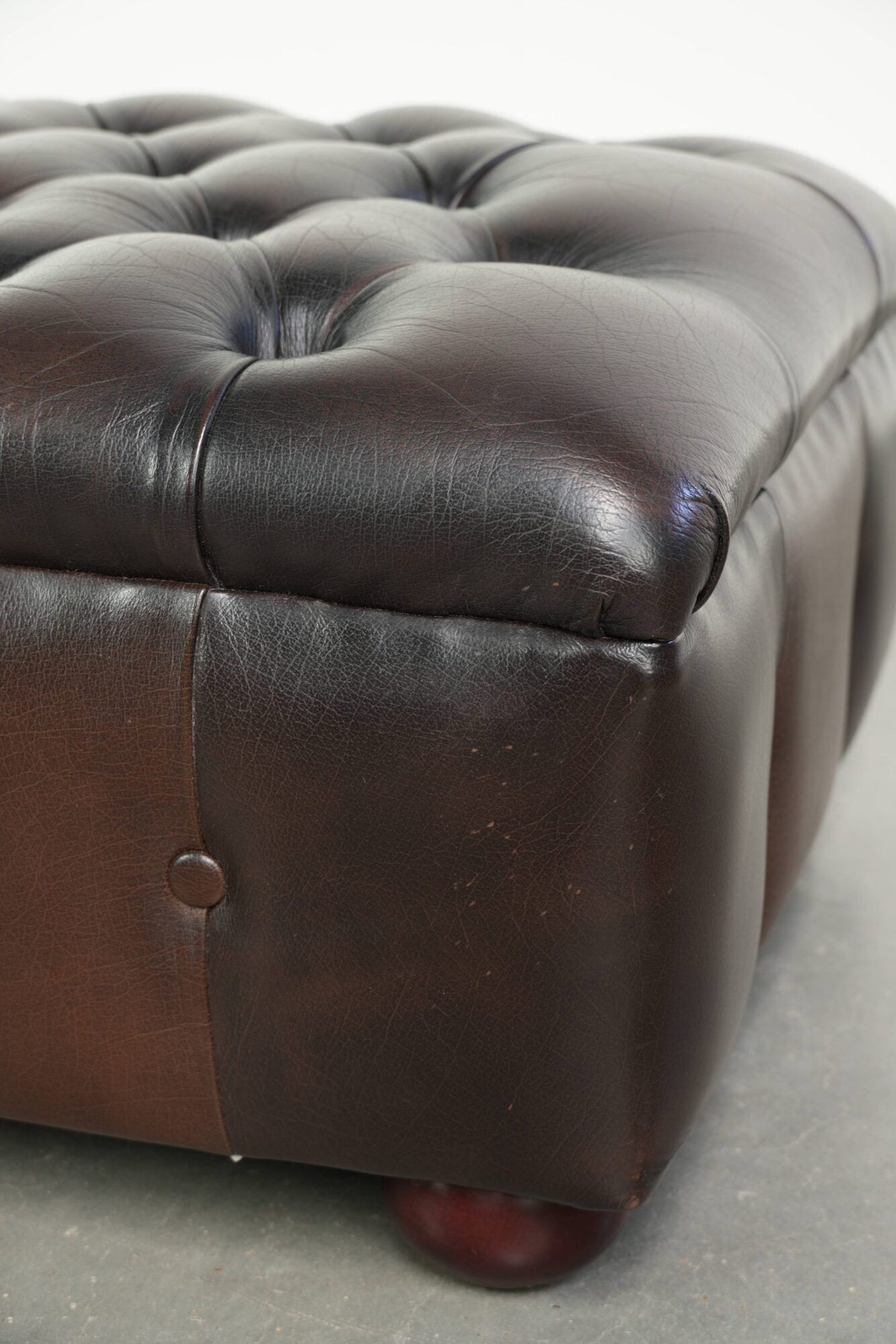 Cowhide Chesterfield ottoman with beautiful colours in English style
