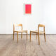 Paire de chaises de salle à manger modèle 75 par Niels O. Møller en chêne