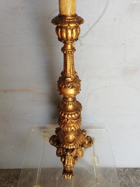 Wooden candlestick and gilded stucco from the beginning of the 20th century