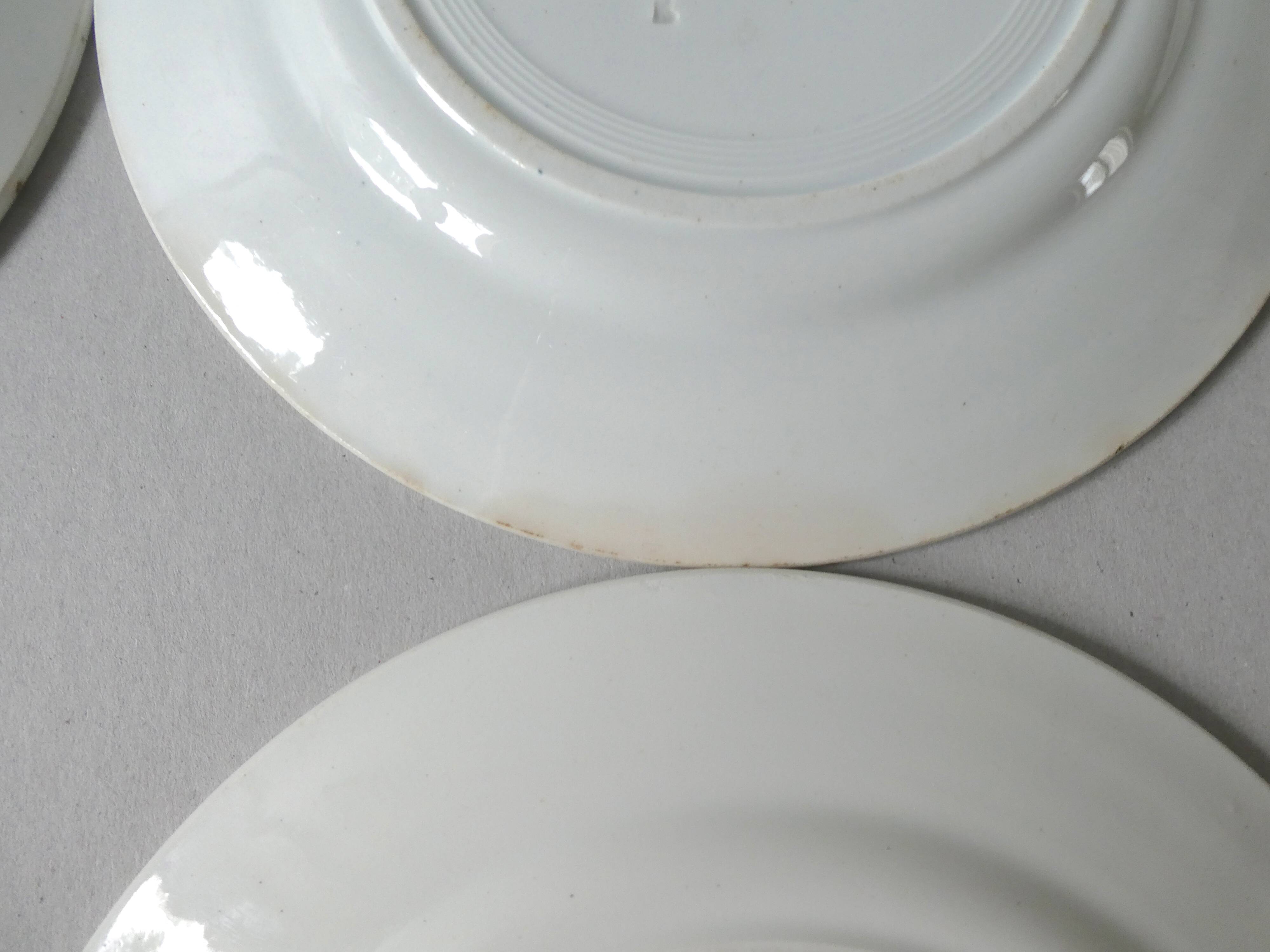 Set of 6 flat plates, Saint Amand model Suzanne, floral decoration