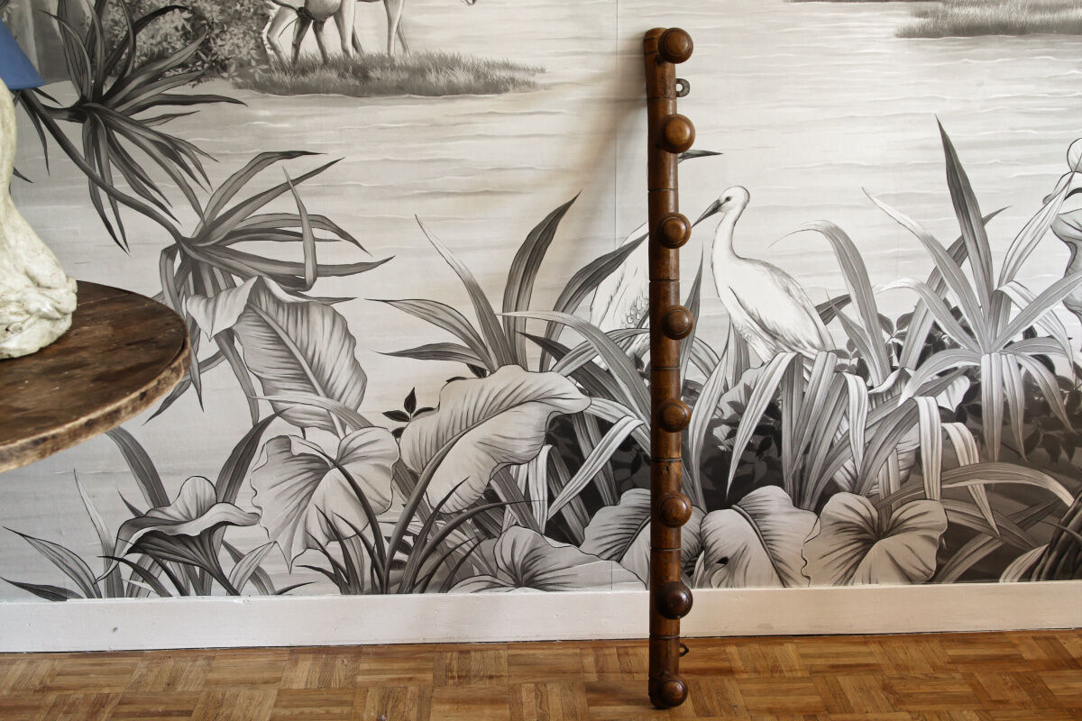 Wall mounted wooden coat rack turned