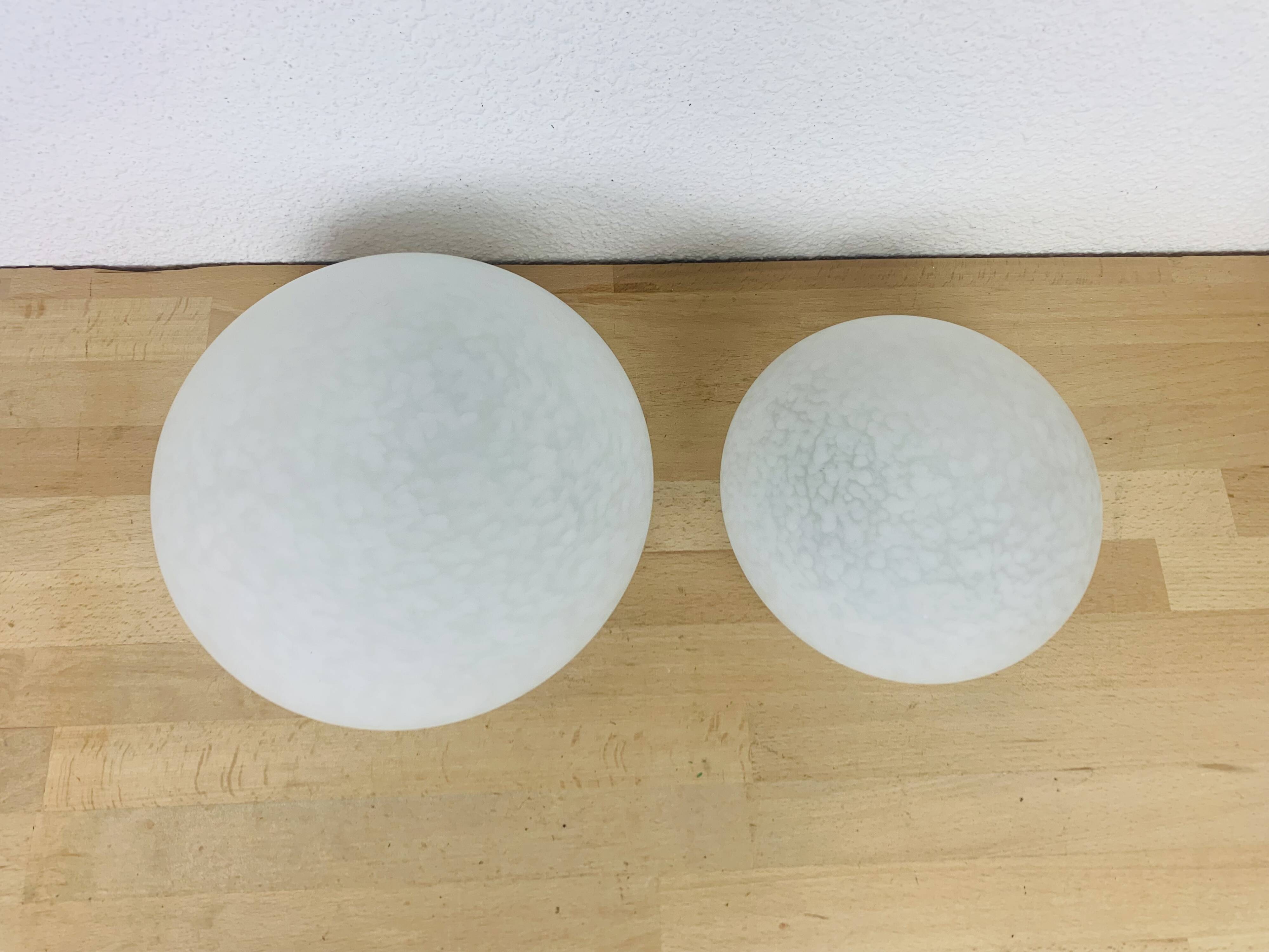 Pair of speckled glass ball wall lights from Vianne, half sphere