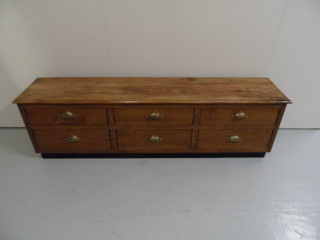 Vintage low TV cabinet from the 1950s with drawers.