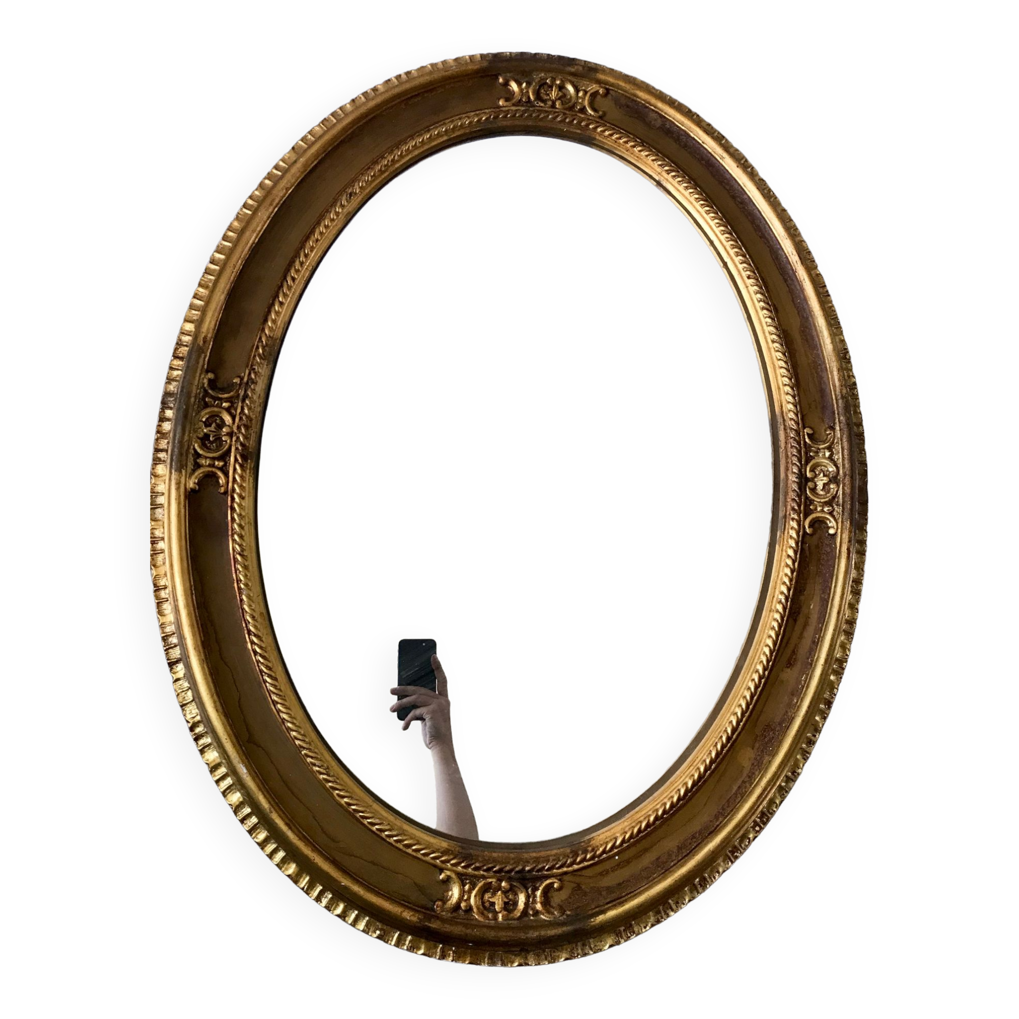 Grand miroir oval en stuc doré vintage