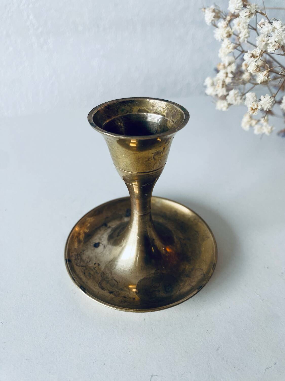 Golden brass candle holder