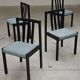 Set of 4 modernist black chairs with light blue ribbed fabric