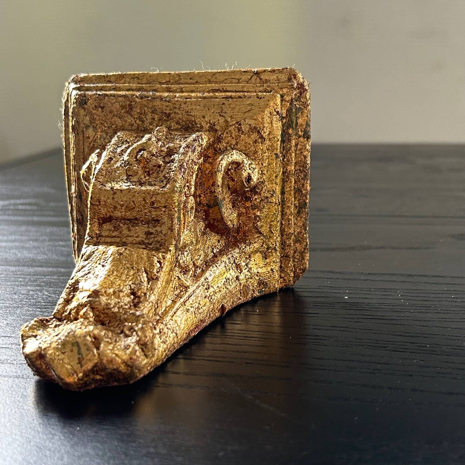 Small console in gilded plaster