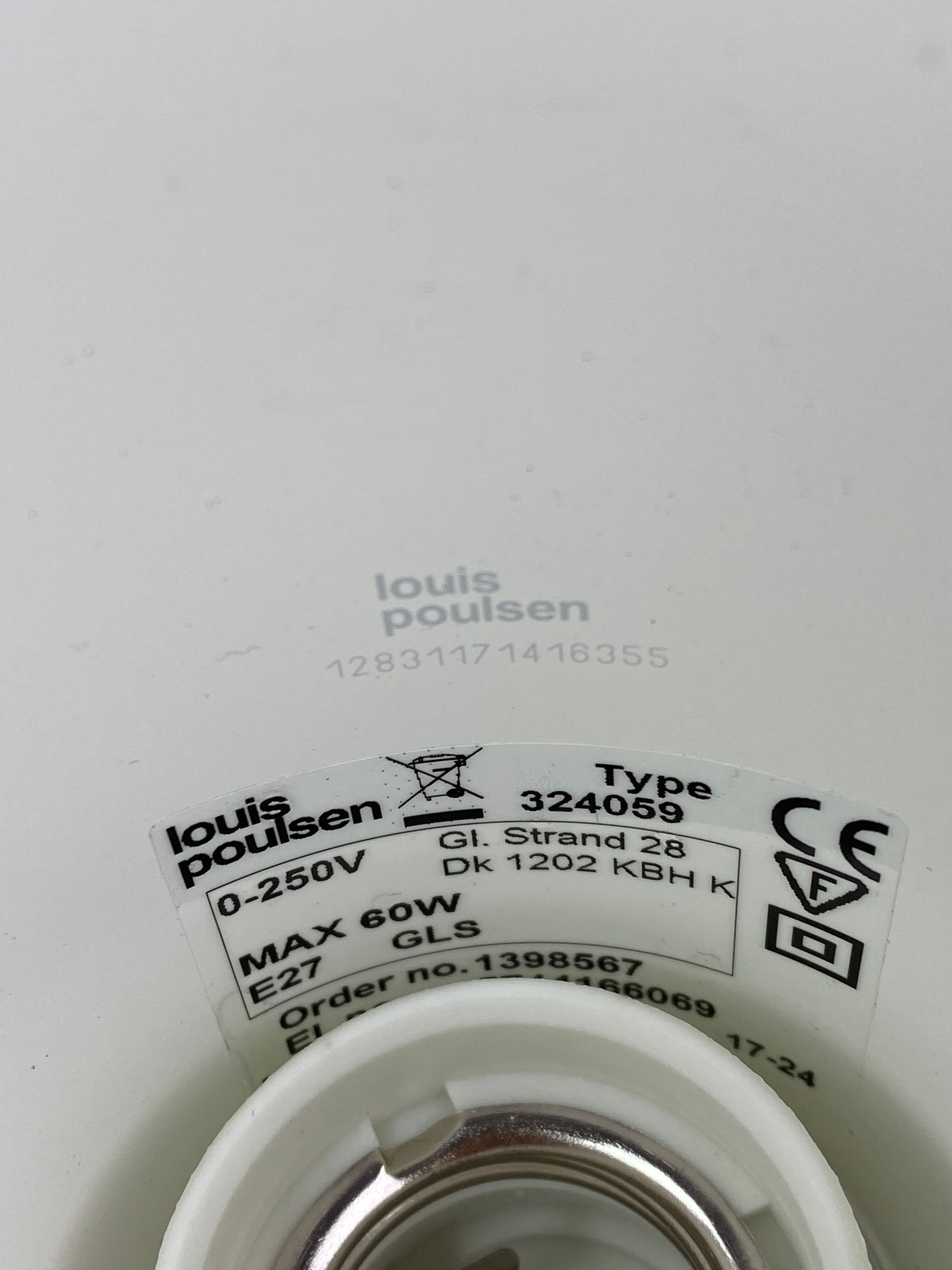 Black table lamp designed by Arne Jacobsen and manufactured by Louis Poulsen