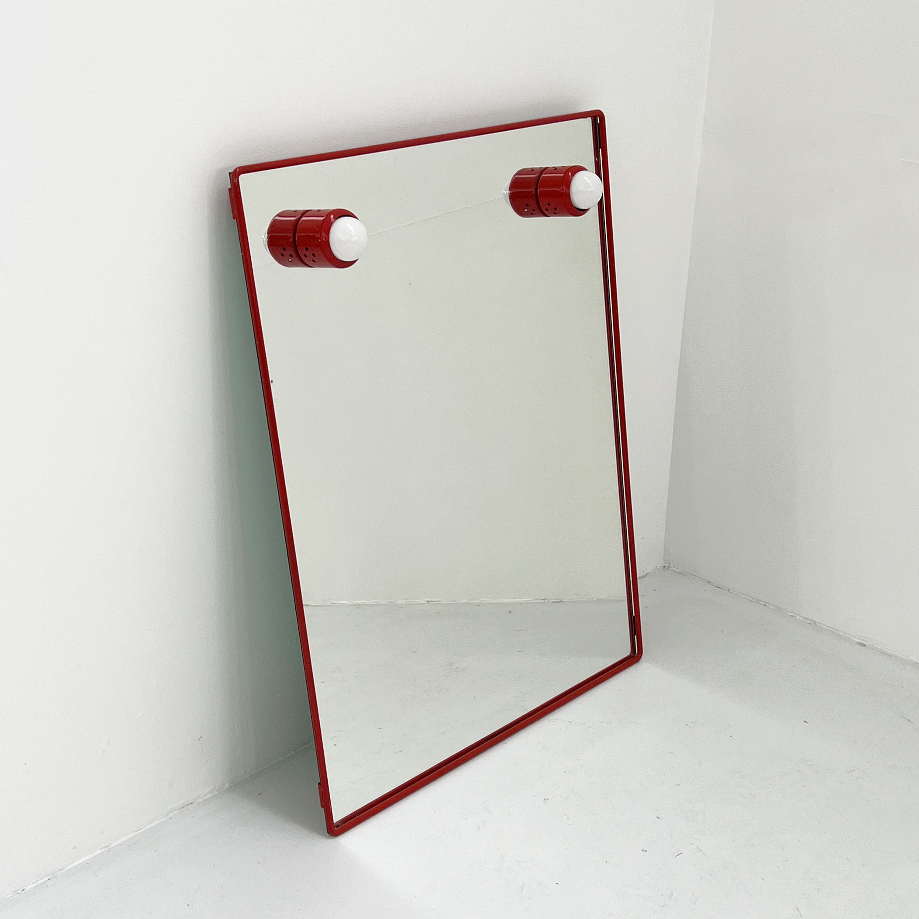 Mirror with red metal bulbs, 1970