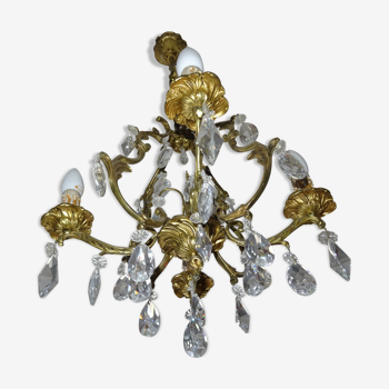 Bronze chandelier has crystal tassels