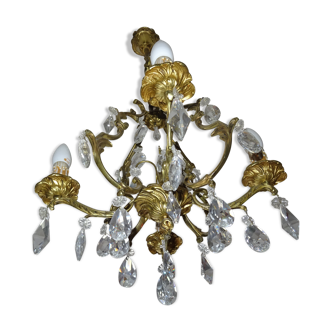 Bronze chandelier has crystal tassels