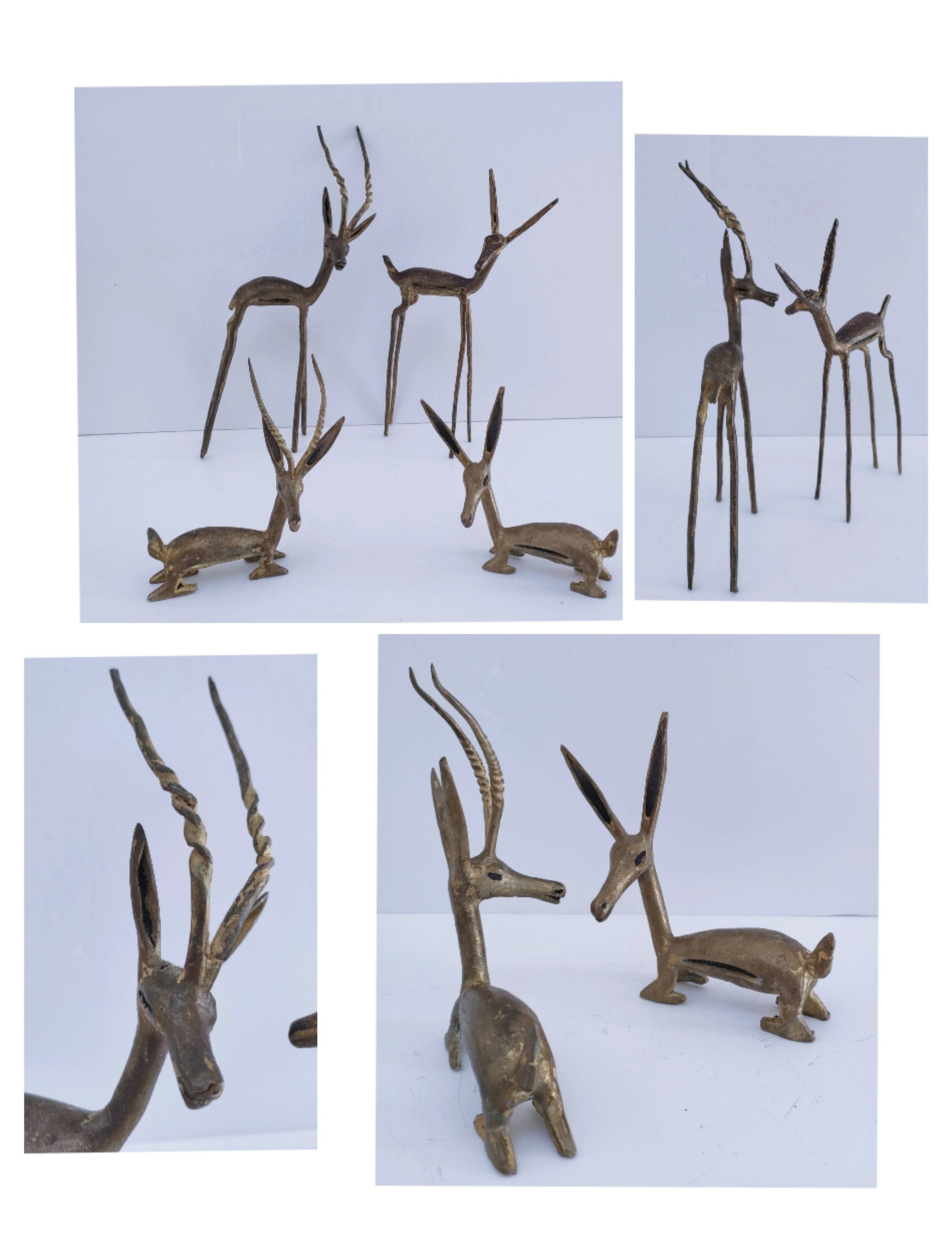 four vintage brass gazelle antelope sculptures