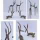 four vintage brass gazelle antelope sculptures