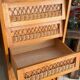 Vintage 1960s chest of drawers / chiffonnier with tapered legs and rattan.