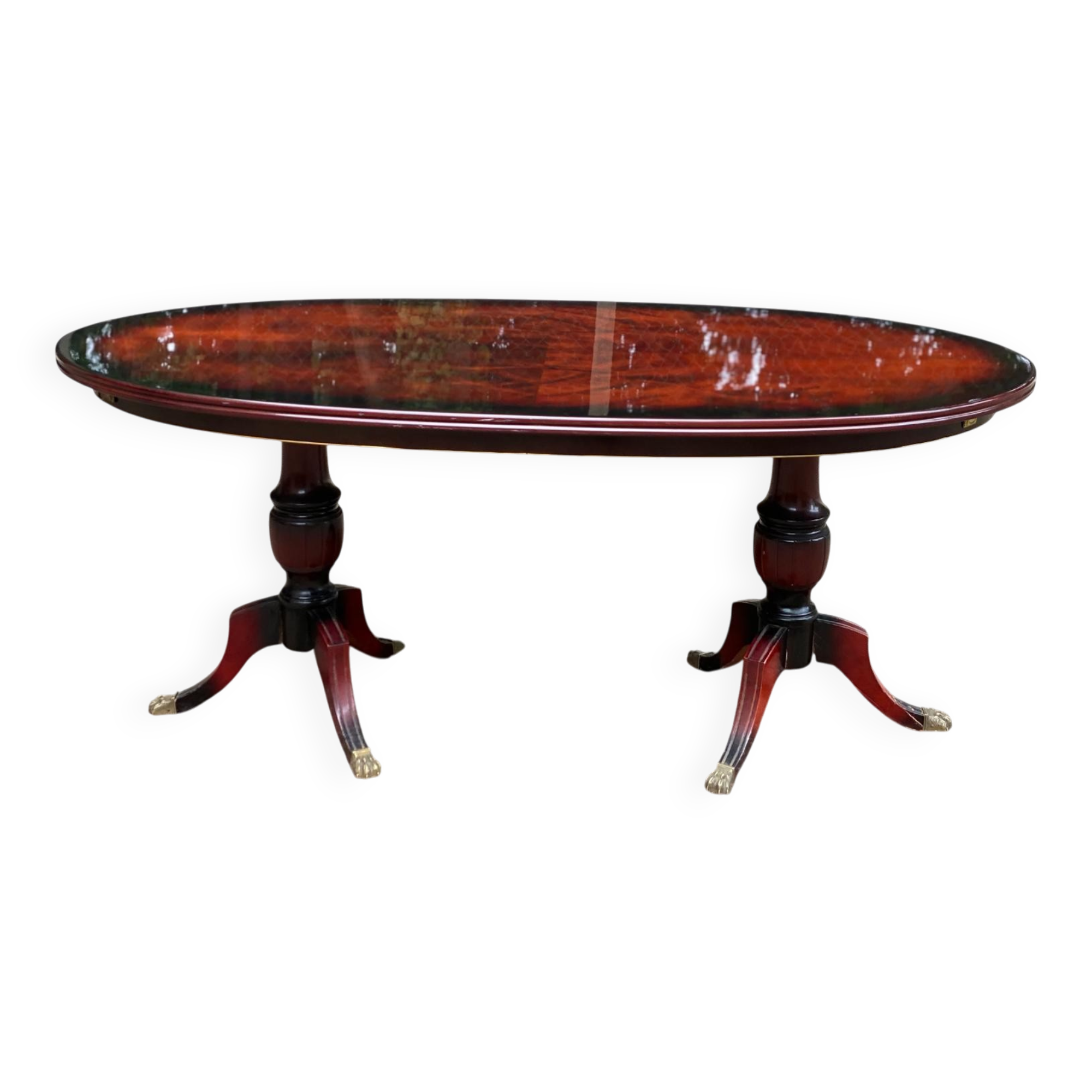 Glossy mahogany dining table in English Regency style from the 1970s.