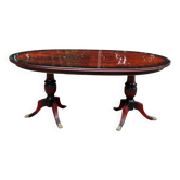 Glossy mahogany dining table in English Regency style from the 1970s.