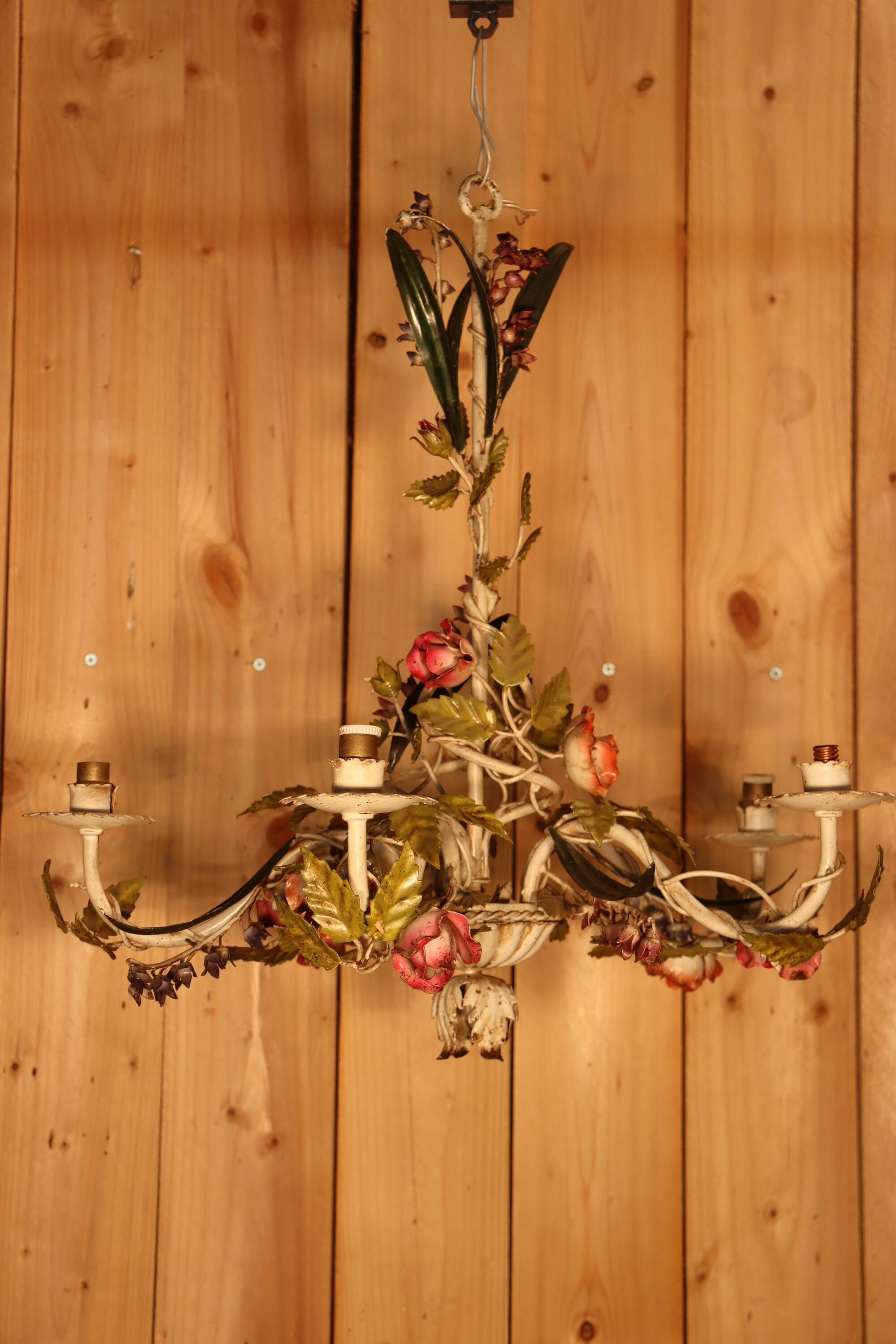 Antique iron chandelier with Art Nouveau floral decoration