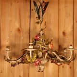 Antique iron chandelier with Art Nouveau floral decoration