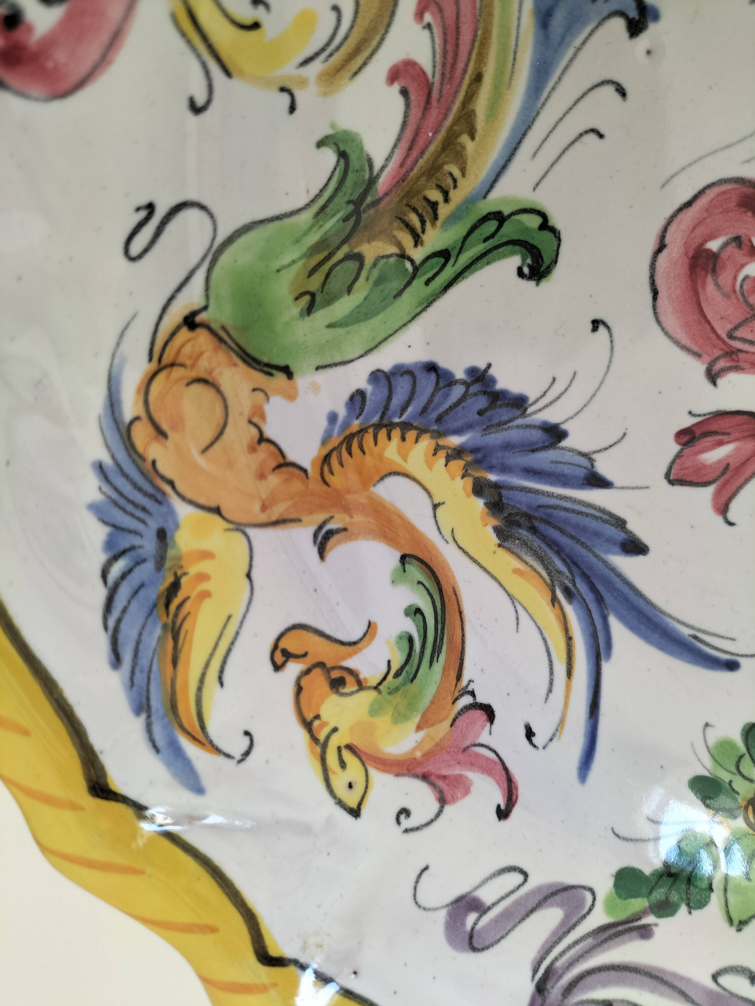 4 hand-painted earthenware plates in a holiday home style