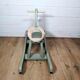 Green and beige wooden rocking horse
