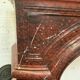Pair of Louis XIV style fireplaces in red cherry marble. XIX century.