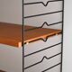 Scandinavian Hylla teak wall shelf with brass label