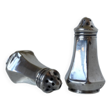 Antique salt and pepper shakers in solid English silver