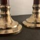 Pair of brass and mahogany wood candle holders
