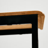 Chaise en teck sur base en métal