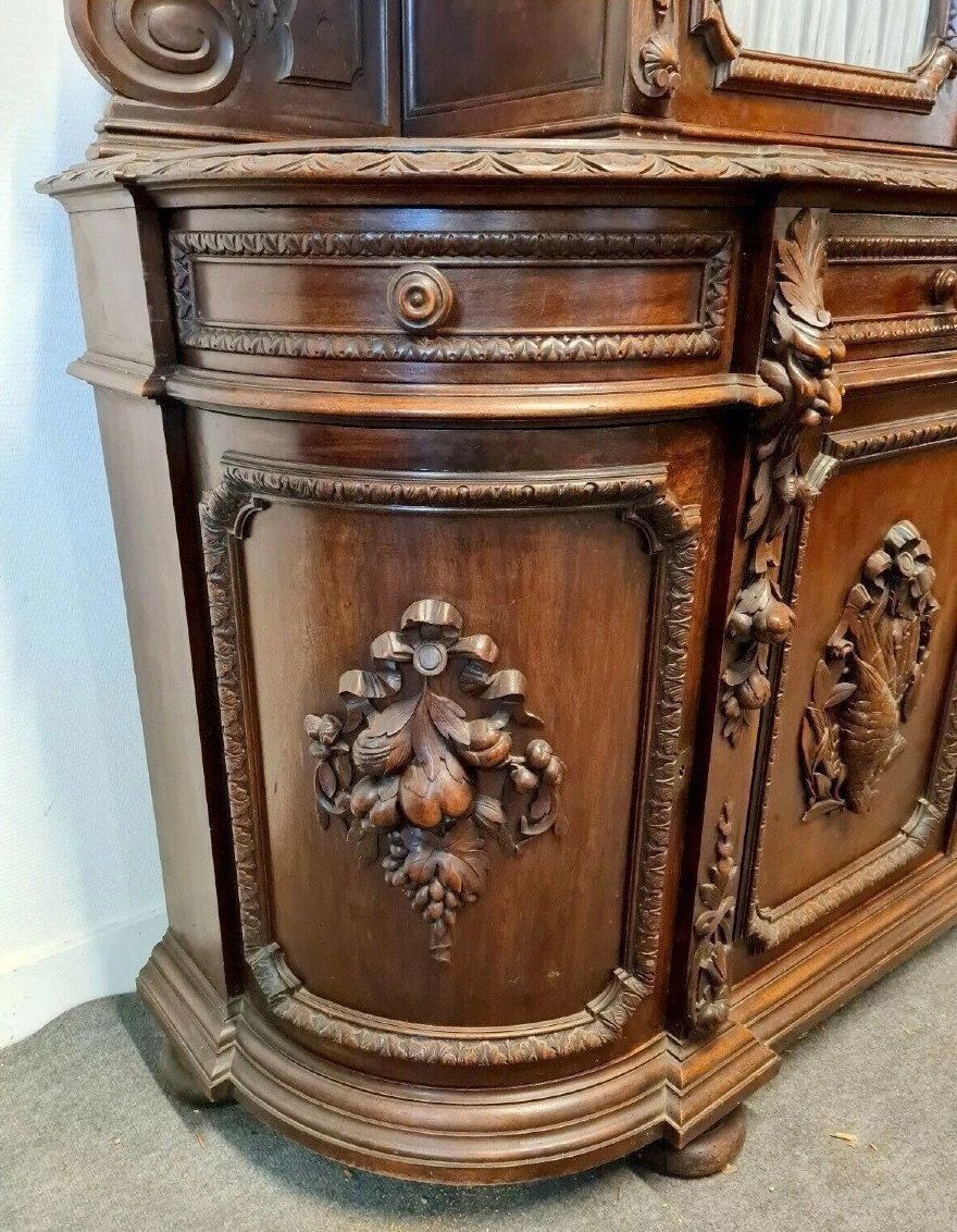 Important two-body buffet from a hunting lodge in carved walnut, Renaissance style.