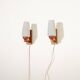Pair of teak and opaline glass wall lamps, 1950s/1960s
