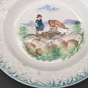 Large antique hollow dish from the 19th century, earthenware with pastoral decoration featuring a child, pig, and goose.