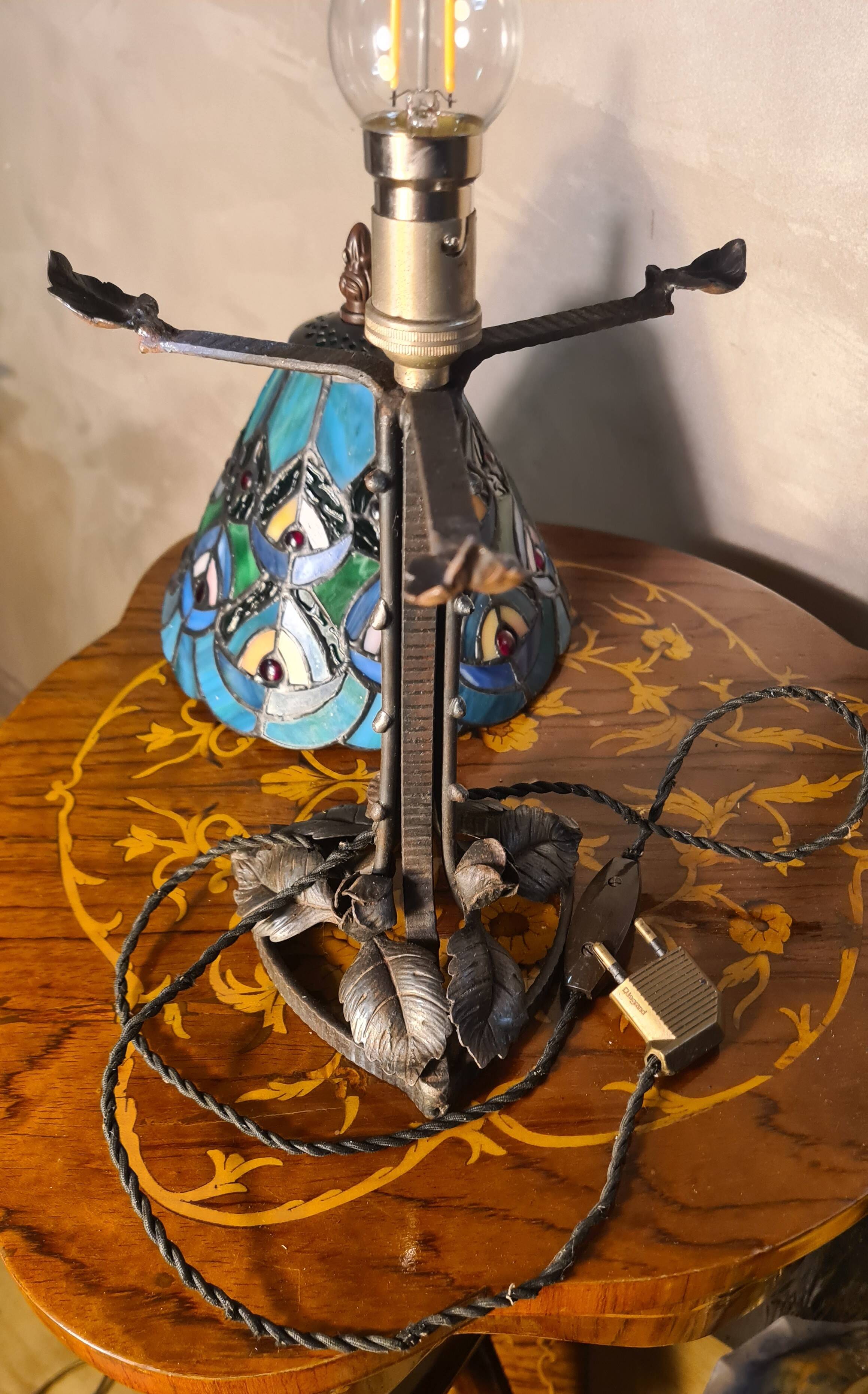 antique wrought iron floor lamp, 1900 to 1940 with stained glass lampshade