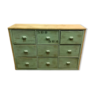 Furniture of metier enfilade with restored wooden drawers