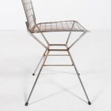 Pair of vintage Italian architectural design steel wire chairs from the 1970s