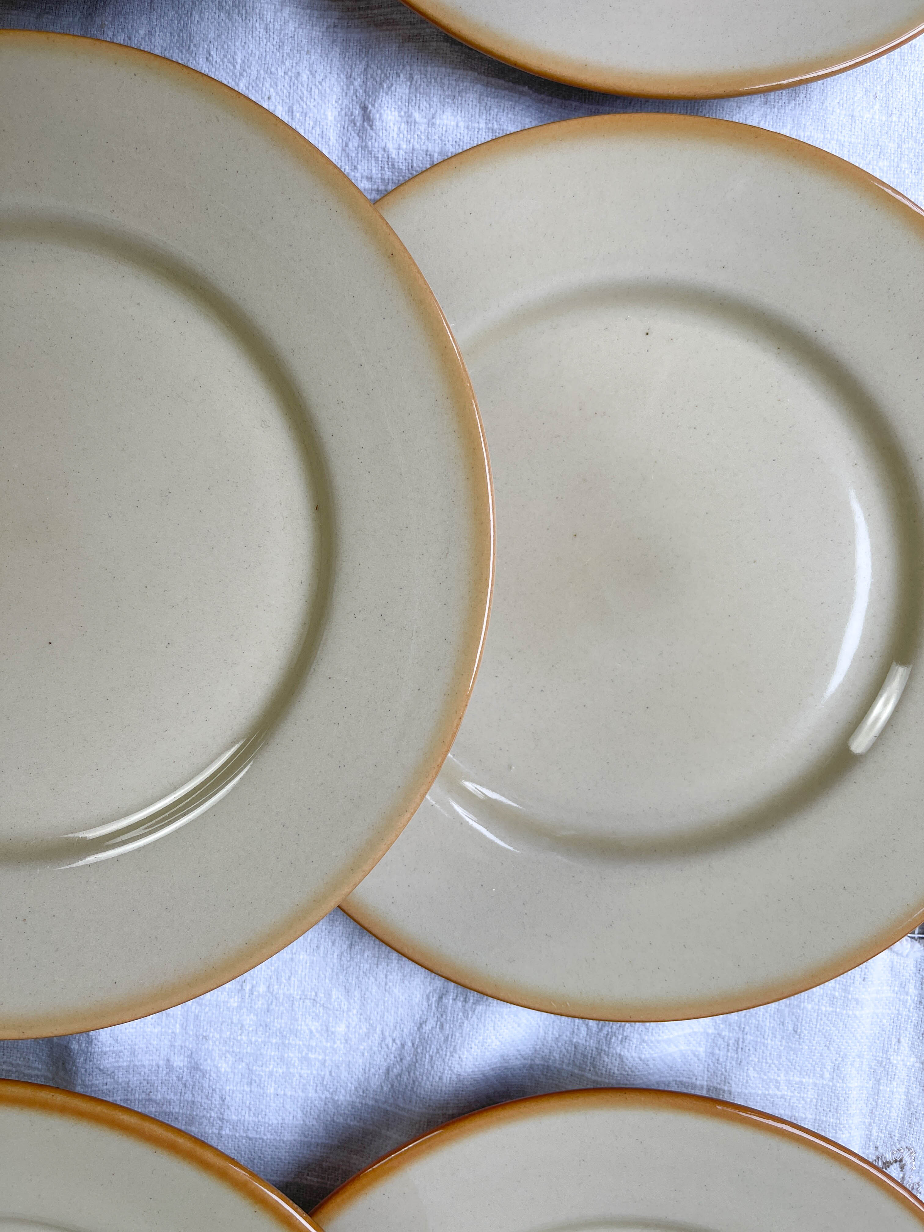 9 mid-century beige Tulowice stoneware plates
