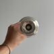 Patinated silver-plated metal candlesticks