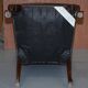 Gainsborough armchair George II leather Chesterfield hand-carved with claw and ball feet.