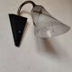 1950s wall lamp, metal, flexible brass stem and opaque shade.