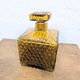 Amber glass liqueur carafe with diamond pattern