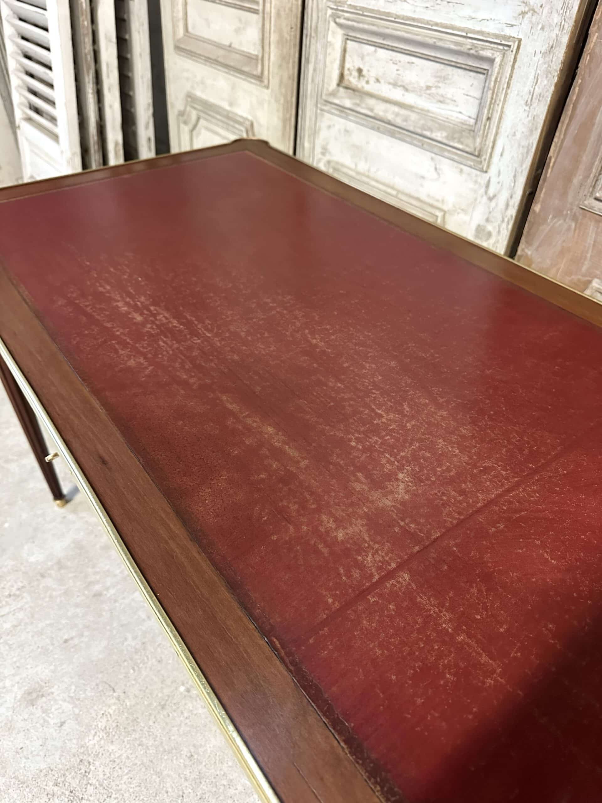 Louis XVI style flat desk in mahogany from around 1950.