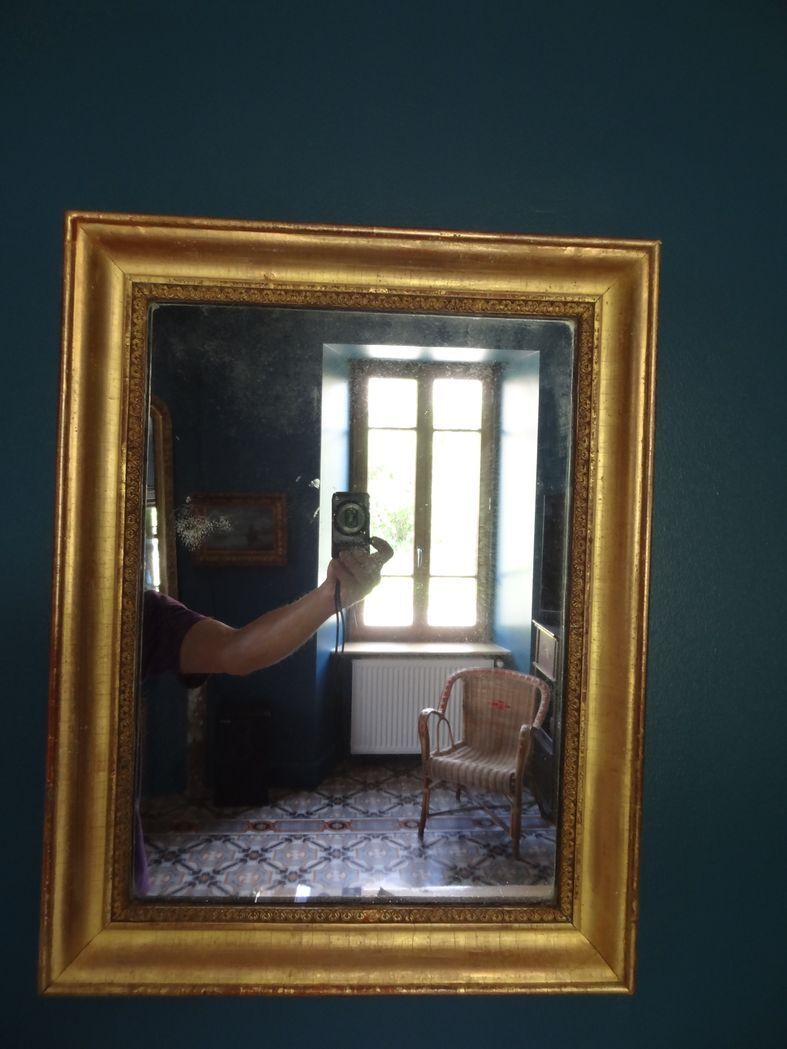 Mirror Empire, early nineteenth, gilded with leaf, h 56 cm