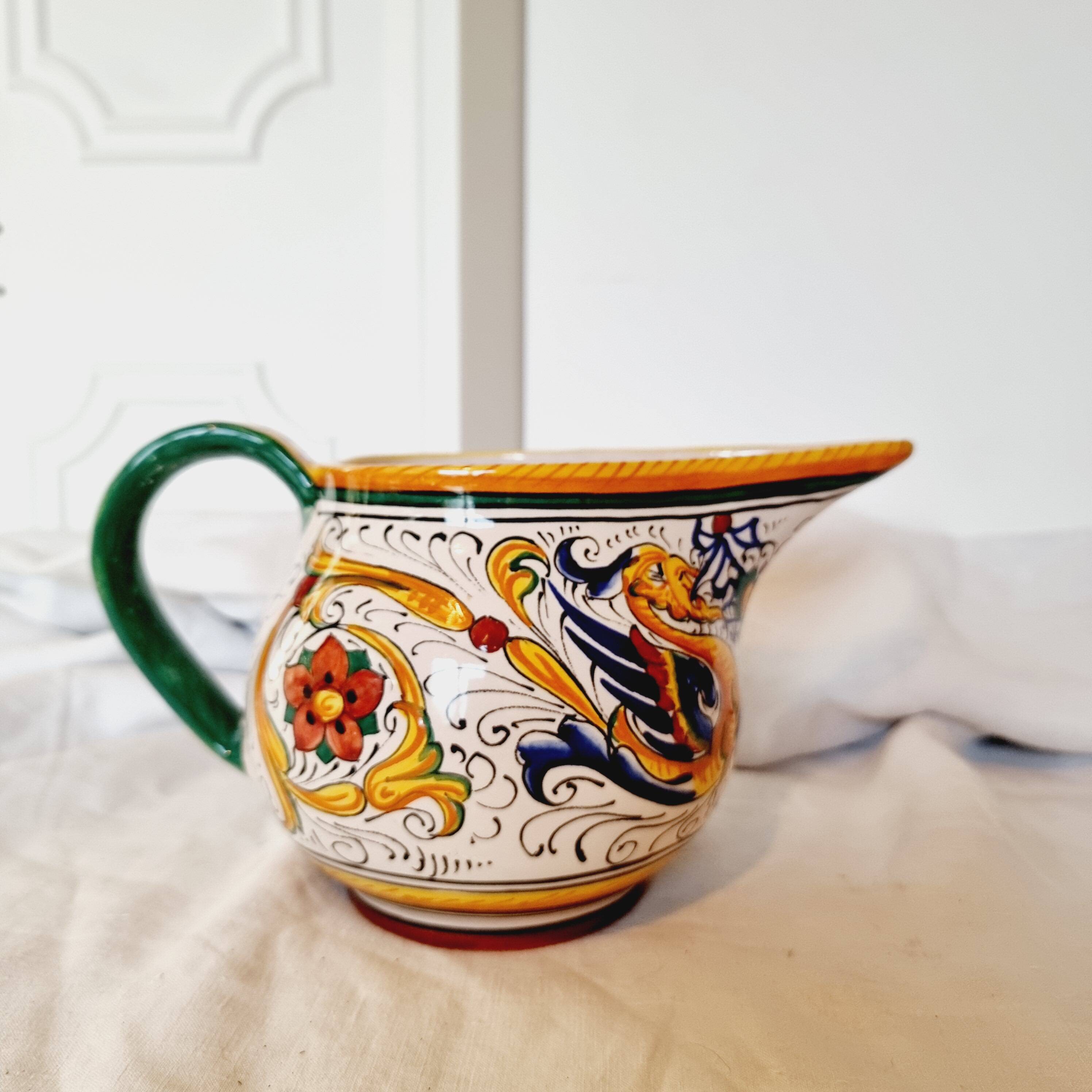 Majolica ceramic jug by R. Deruta, Italy, hand-painted, with a long spout.  Decorated with a dragon tree