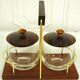 Scandinavian condiment servant made of olive wood