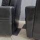 2 Black leather arm chairs 1960s on wheels