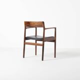 Armchair in rosewood and black leather, by J. Norgaard, Denmark, 1960s