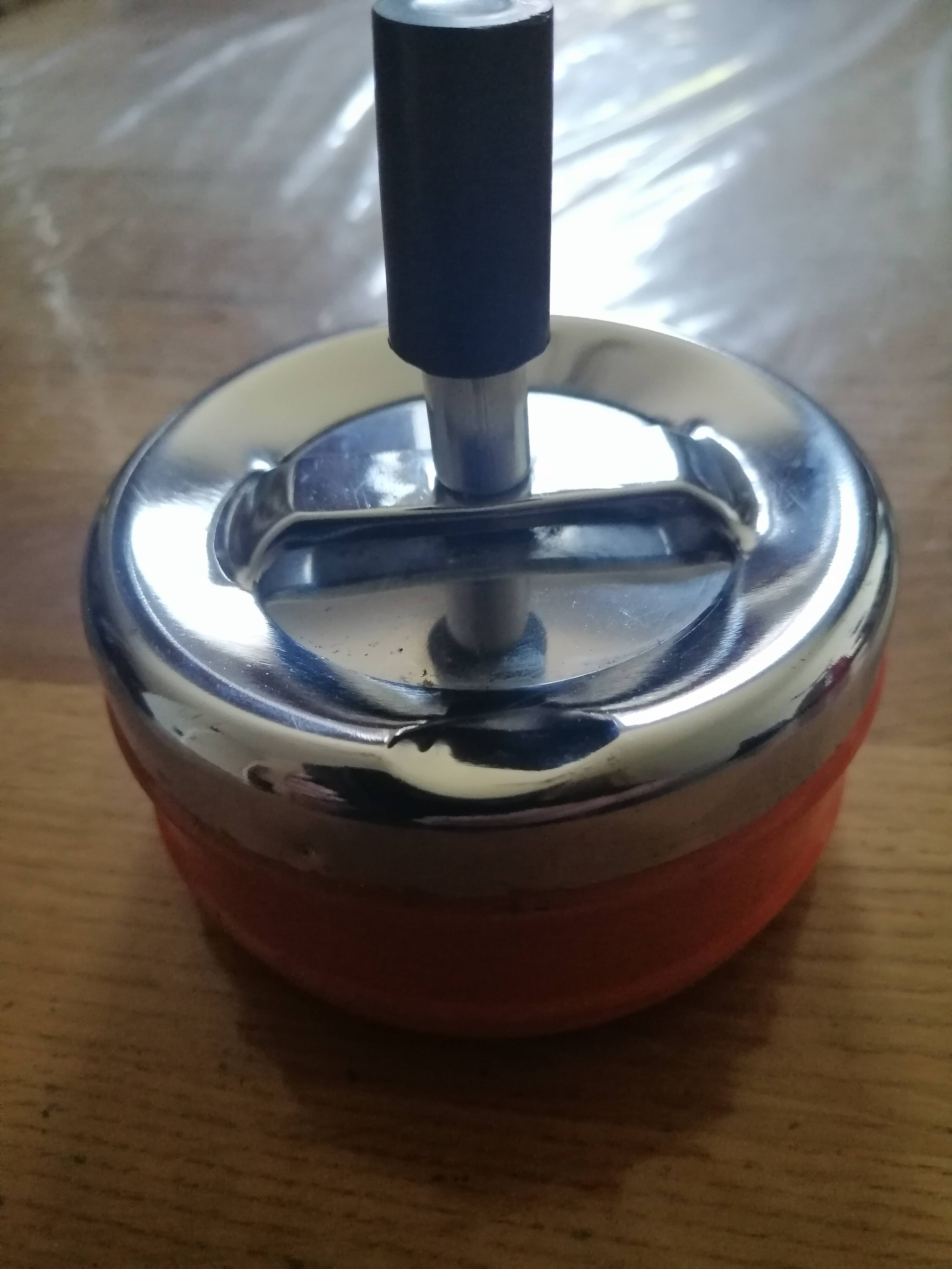 Vintage orange rotating ashtray