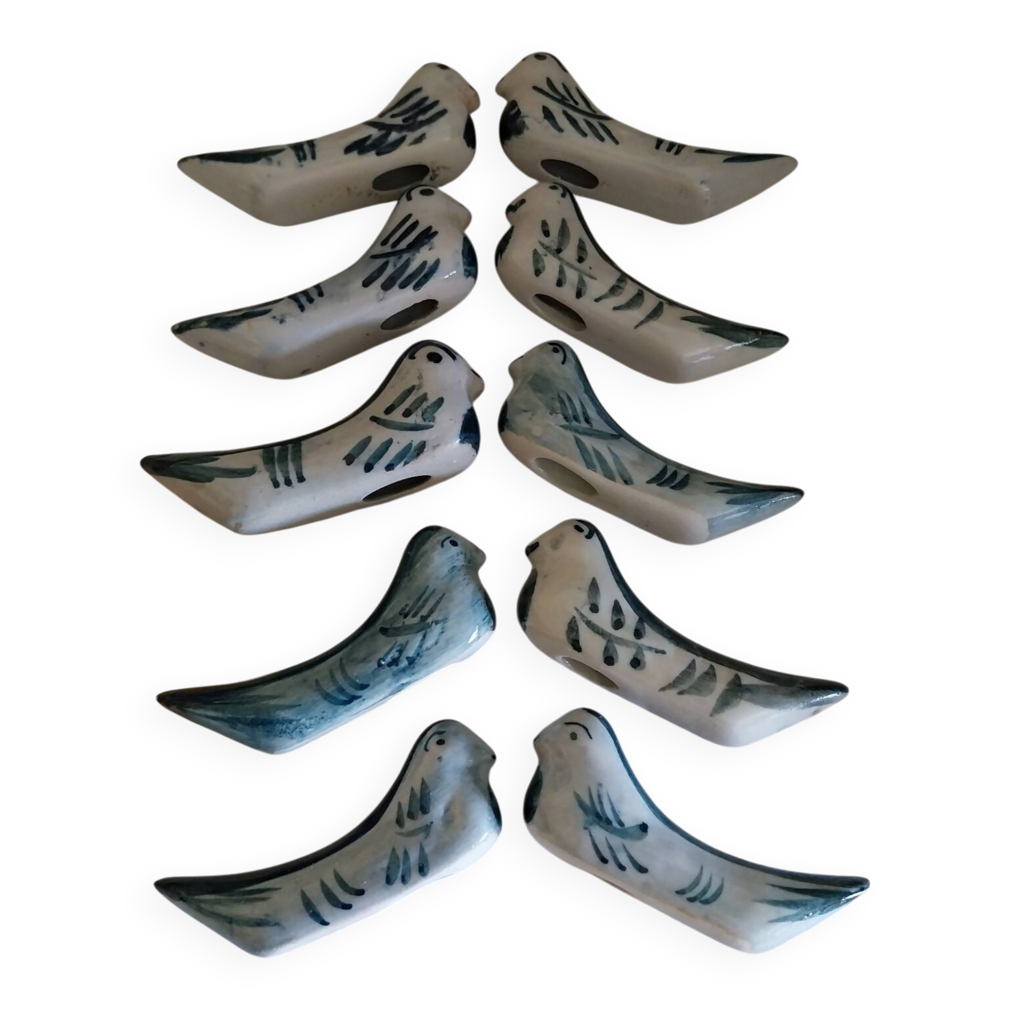 Ceramic knife rests in the shape of birds